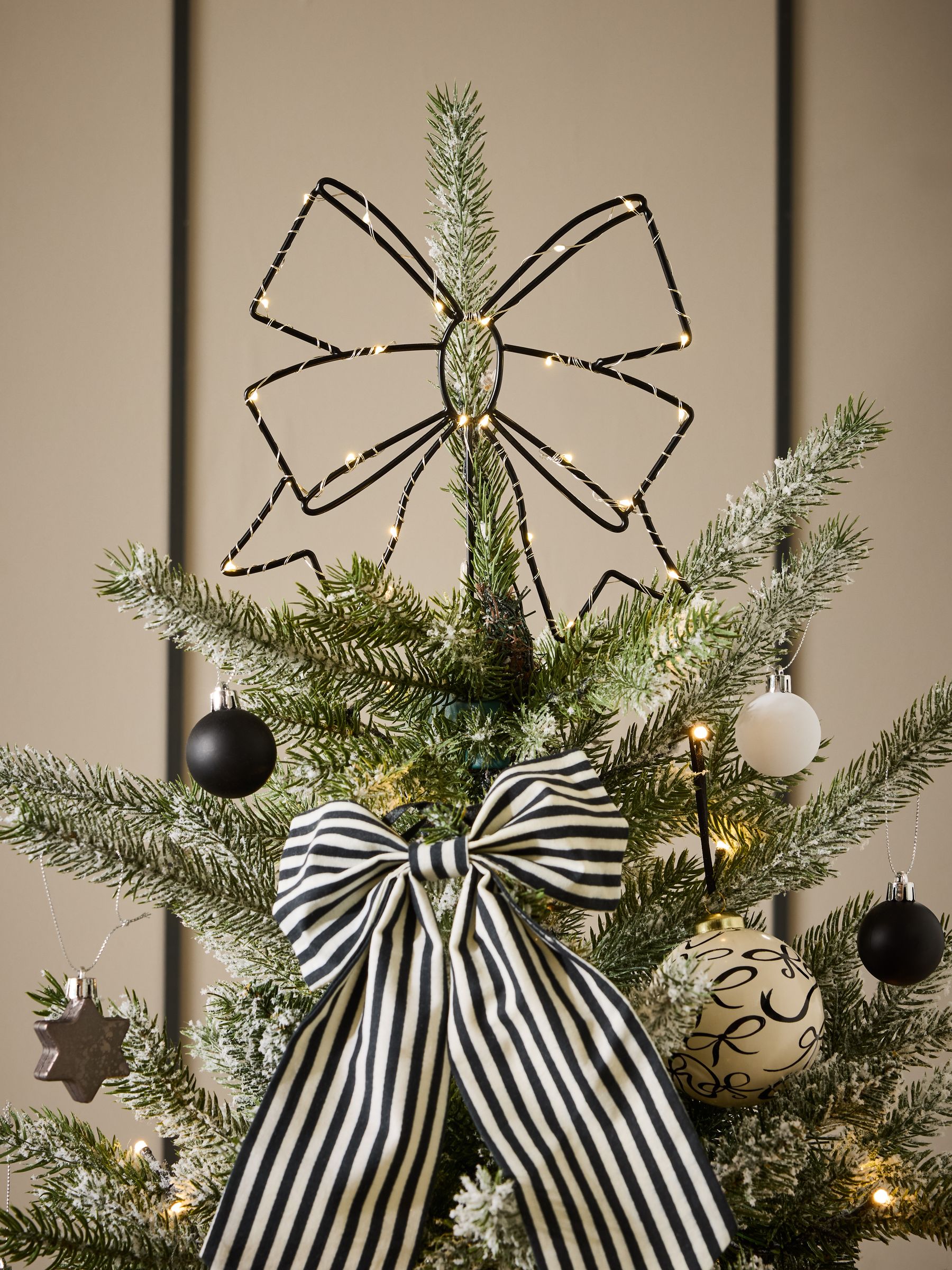 Black Light Up Bow Christmas Tree Topper