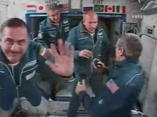 Orbital Rendezvous: Fresh Crew, Brazilian Astronaut Arrive at ISS