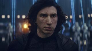 A scarred Kylo Ren looks at someone off camera in Star Wars: The Rise of Skywalker