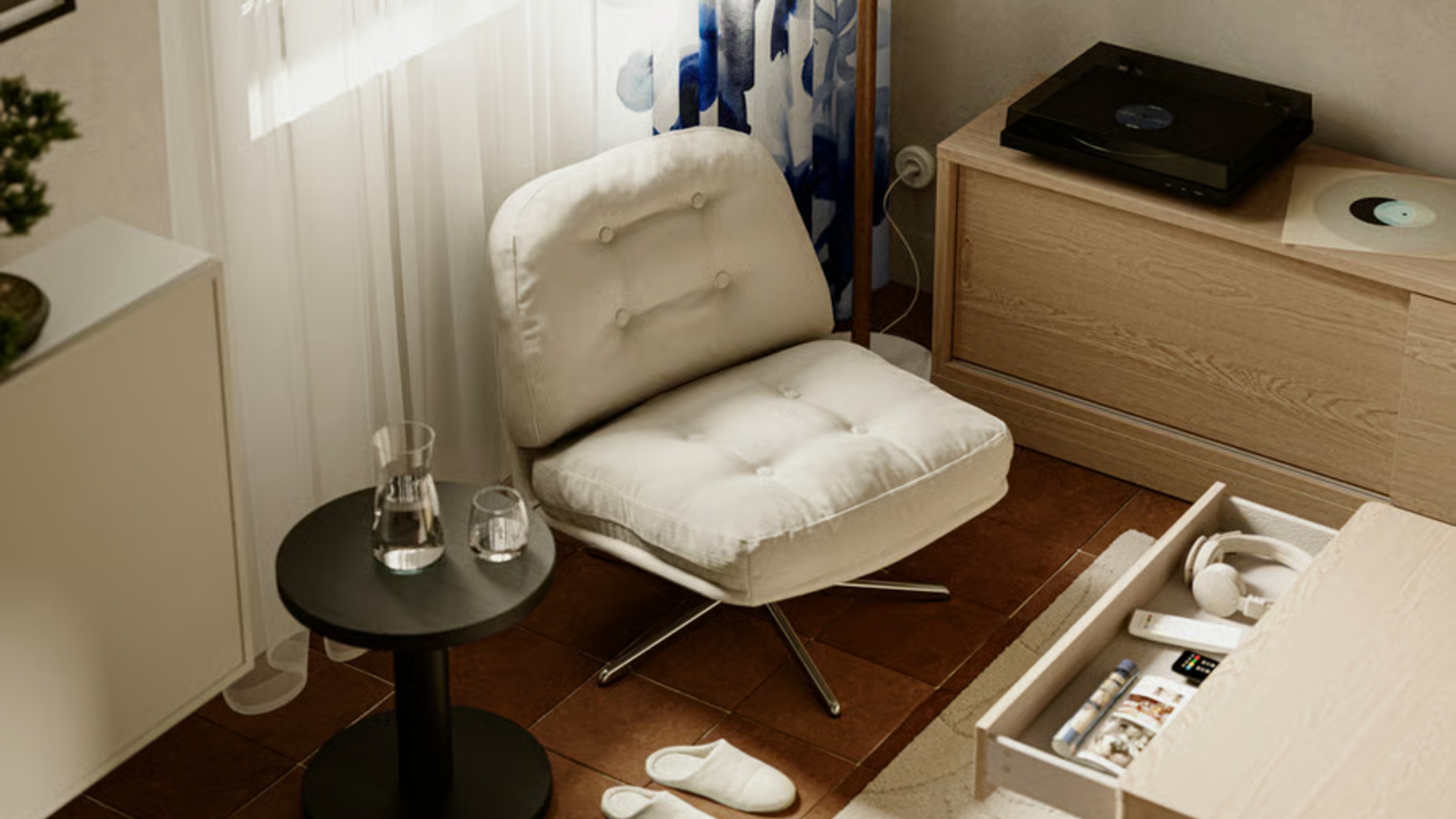 The IKEA DYVLINGE Swivel easy chair in beige in a modern living room