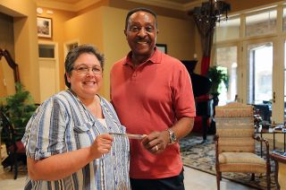 Torie Lazaros with space shuttle astronaut Winston Scott and his flown hair comb in a scene from "Space Dealers."