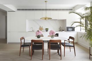 Asta House interior featuring dining table and chairs