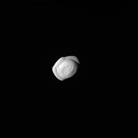 Space Ravioli! Odd Shape of Saturn's 'Flying Saucer' Moon Pan Revealed ...