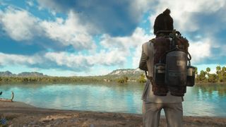 Far Cry 6 screenshot of a character with their back to the player, facing a large lake and wearing an oxygen tank.