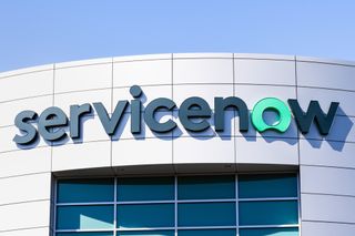 ServiceNow logo on the side of a white building