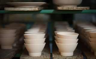 Seven different bowls, five sizes of plates and a couple of cups