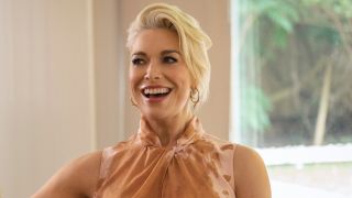 Hannah Waddingham laughing as Rebecca on Ted Lasso.