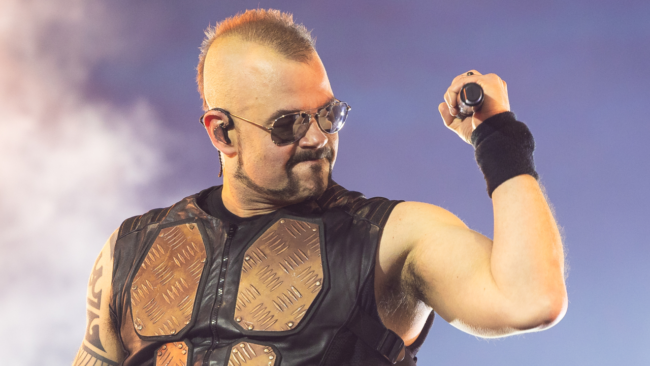 Joakim Brod&eacute;n onstage with Sabaton in 2025