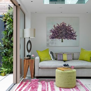 garden room with sliding room and grey sofa