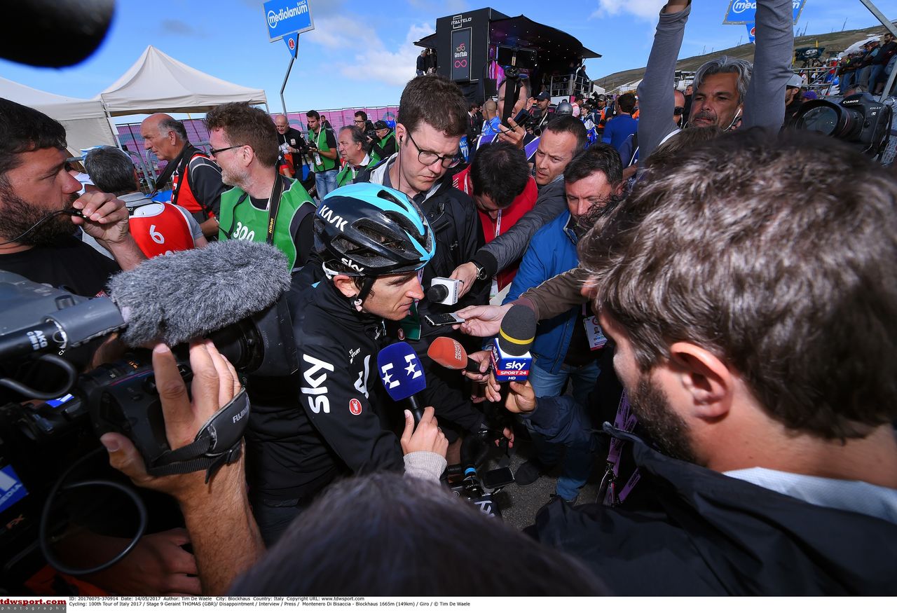 Geraint Thomas talks to the press after being in a crash caused by a motorbike on stage 9 of the 2017 race