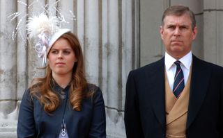 Prince Andrew, Duke of York stands with his daughter, Princess Beatrice on the balcony of Buckingham Palace following the Trooping the Colour ceremony on June 17, 2006.