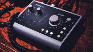An Audient iD24 audio interface one a desk