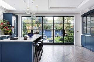 A kitchen overlooking the outdoors