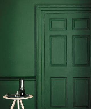 Green living room with color drenching by Little Greene
