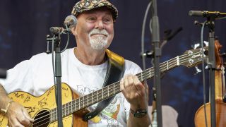 BANBURY, ENGLAND - AUGUST 08: Dave Pegg of Fairport Convention performs at Fairport's Cropredy Convention at Cropredy on August 08, 2024 in Banbury, England. (Photo by Steve Thorne/Getty Images)
