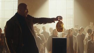 Dwayne Johnson pours soda over a priceless museum artifact in Red Notice