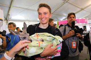 Niklas Eg with a new friend at the Tour Down Under