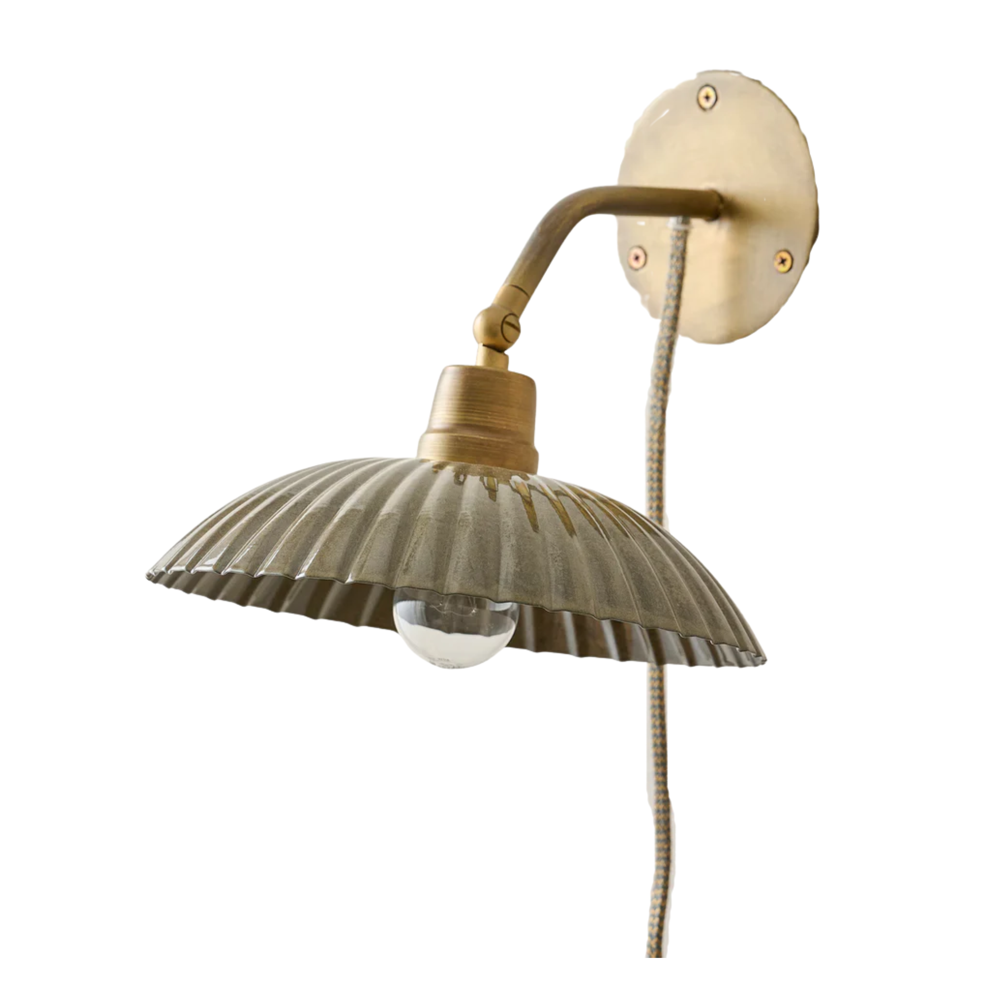 a plug in wall sconce with an olive shade