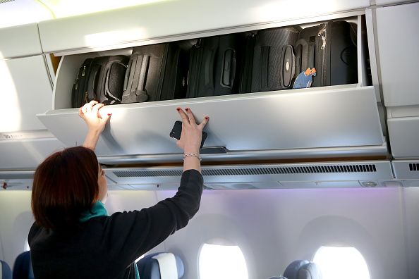 An airplane overhead bin