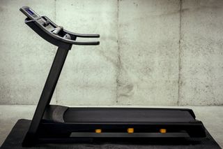 Treadmill in a grey room