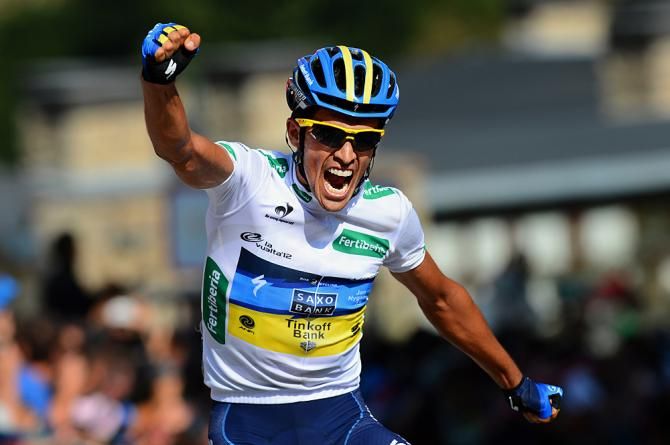 Alberto Contador gives a fist pump after taking the Vuelta lead in 2012