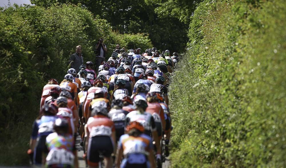 The peloton make their way through the countryside near Stockton on Tees