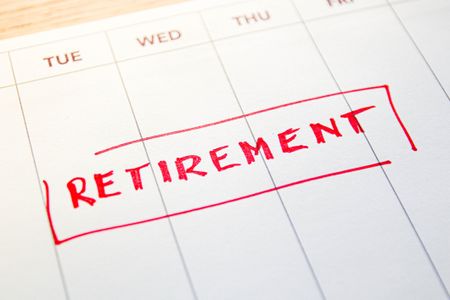 calendar with the word retirement written on it in red