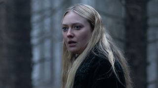 Dakota Fanning's Mina outside in the woods in The Watchers