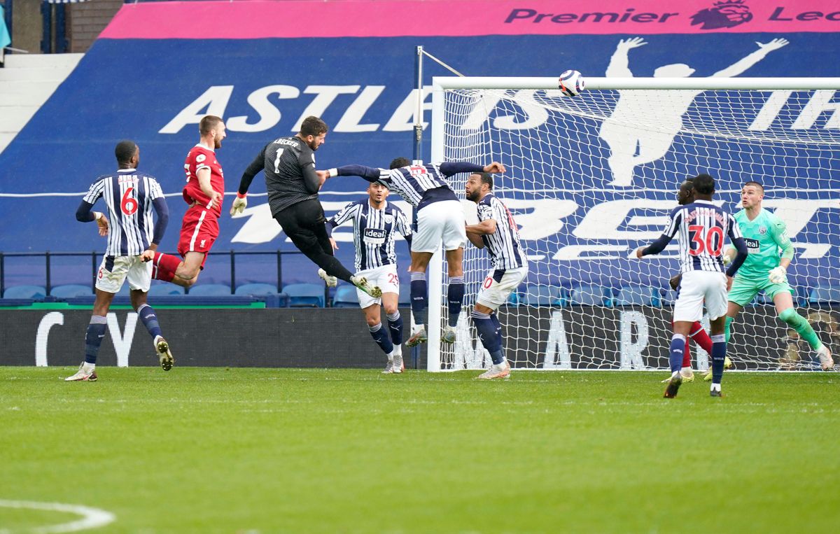 Liverpool goalkeeper Alisson scores the winning goal against West Bromwich Albion in the Premier League match at the Hawthorns, May 2021