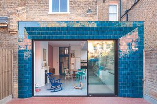 An outdoor space with glazed tiles on the exterior walls