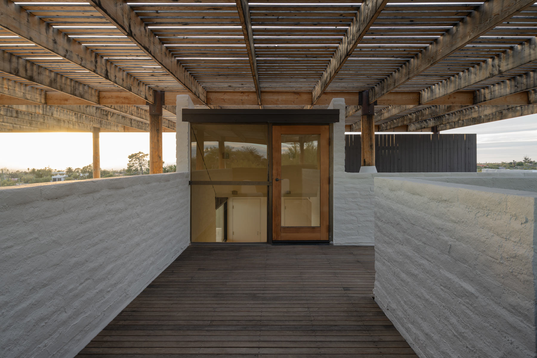 view of Ramada House by Judith Chafee, white, simple modernist house in the american desert