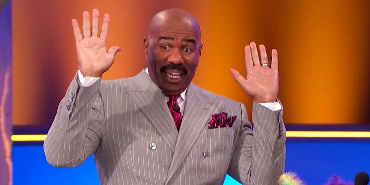 Steve Harvey excited on Family Feud. Good look at his mustache.