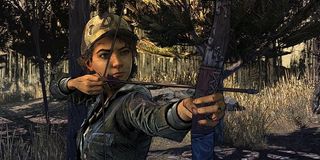 Clementine fires a bow in The Walking Dead.