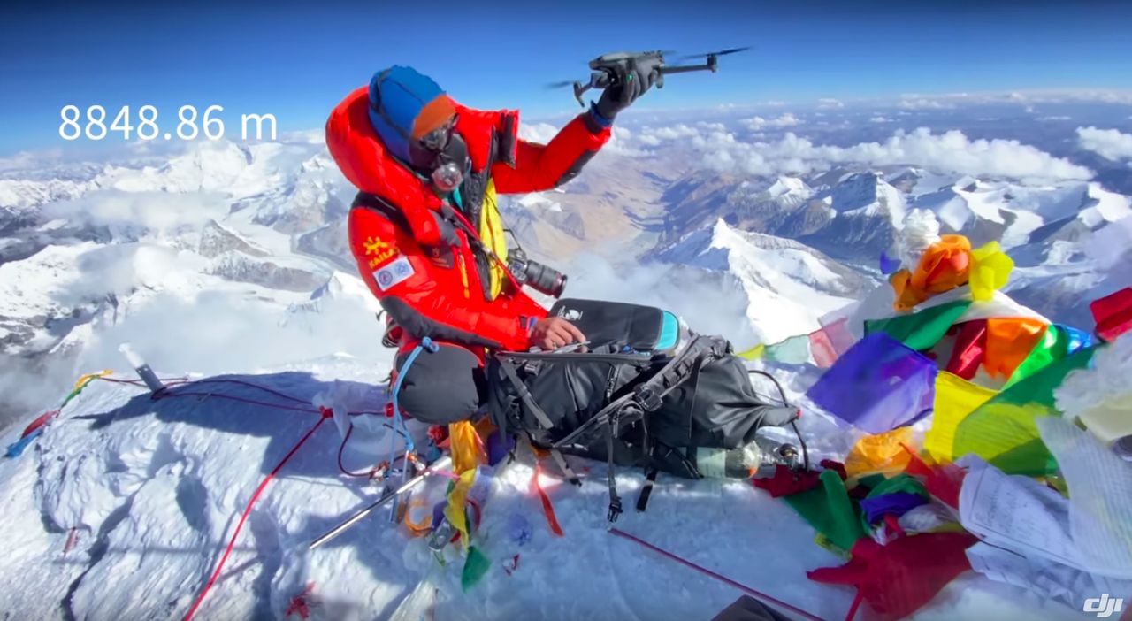 DJI Mavic 3 drone being launched from the summit of Mount Everest