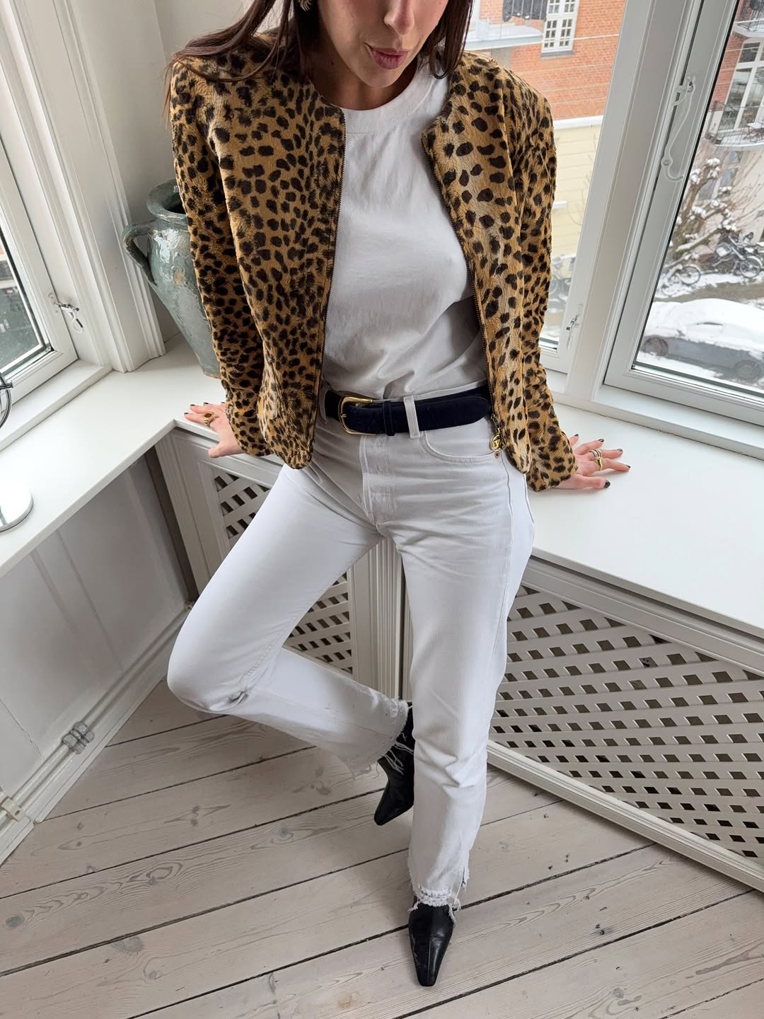 woman wearing winter to spring transitional pant trend 2026