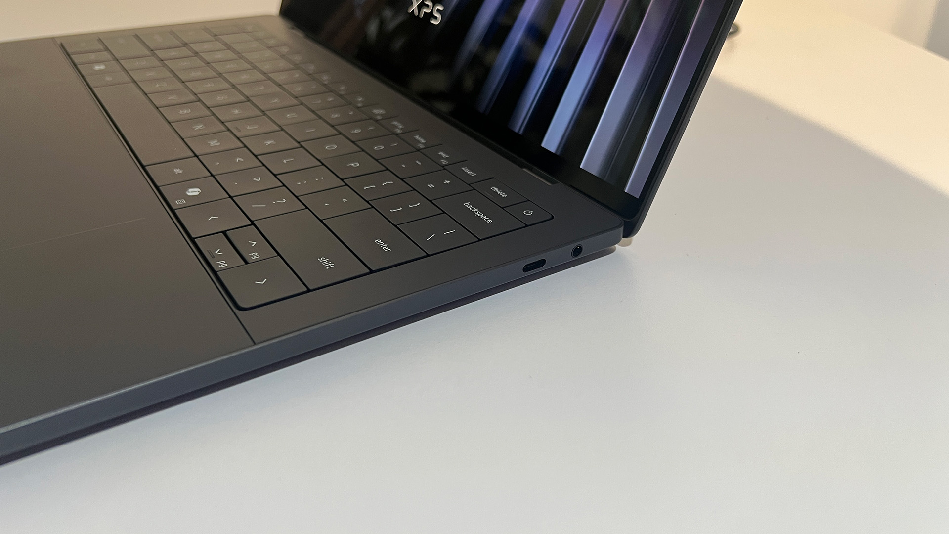 A Dell XPS 14 sitting on display