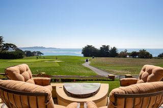 The patio area at Pebble Beach overlooks the 11th green