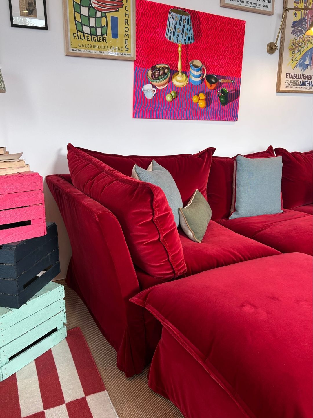 Close-up of the Vesper sofa in Pinot Cotton Velvet, showing its original tall, angled arm, high arm cushion and upholstered skirt.
