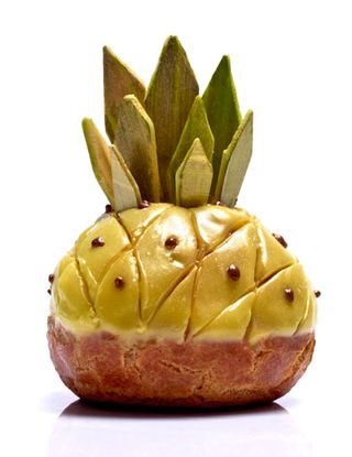 Close up of a pastry pineapple, white background and surface