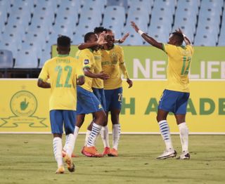 Themba Zwane celebrates his goal with teammates 