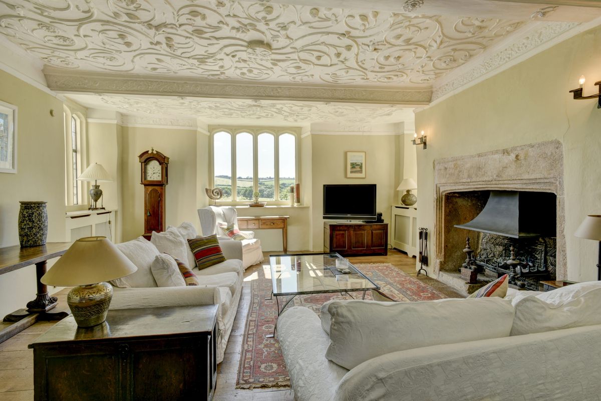 An unassuming farmhouse in rural Devon whose simple exterior conceals ...
