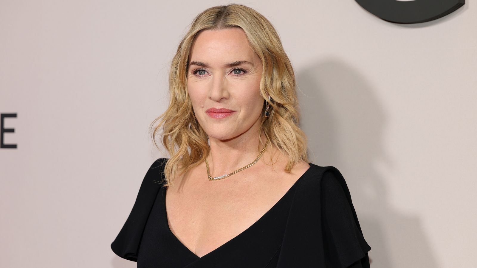 Kate Winslet puts a bold twist on classic pinstripe suits, and it's the tailoring trend to invest in right now