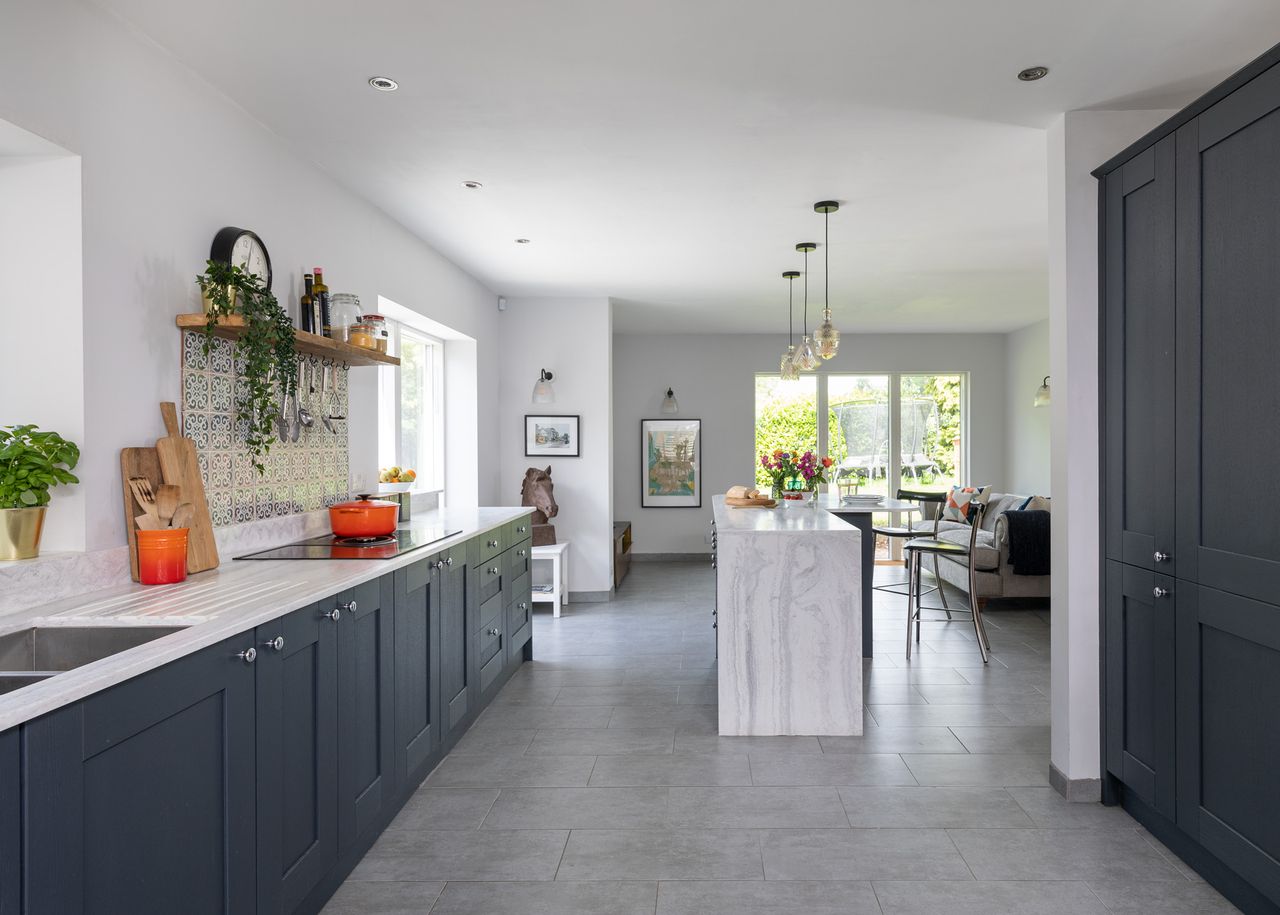 The grey porcelain flooring is from Tile Choice.