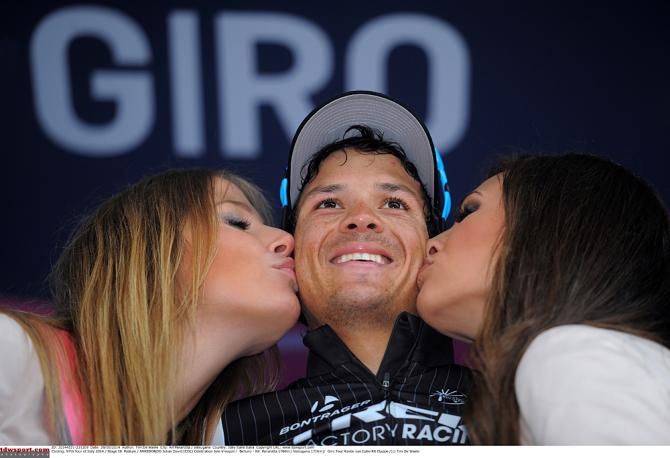 Julian Arredondo (Trek Factory Racing) gets his podium kisses after winning Stage 18