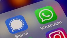iOS app icons for WhatsApp and Signal messaging platforms, with top half of Instagram icon pictured in bottom right hand corner.