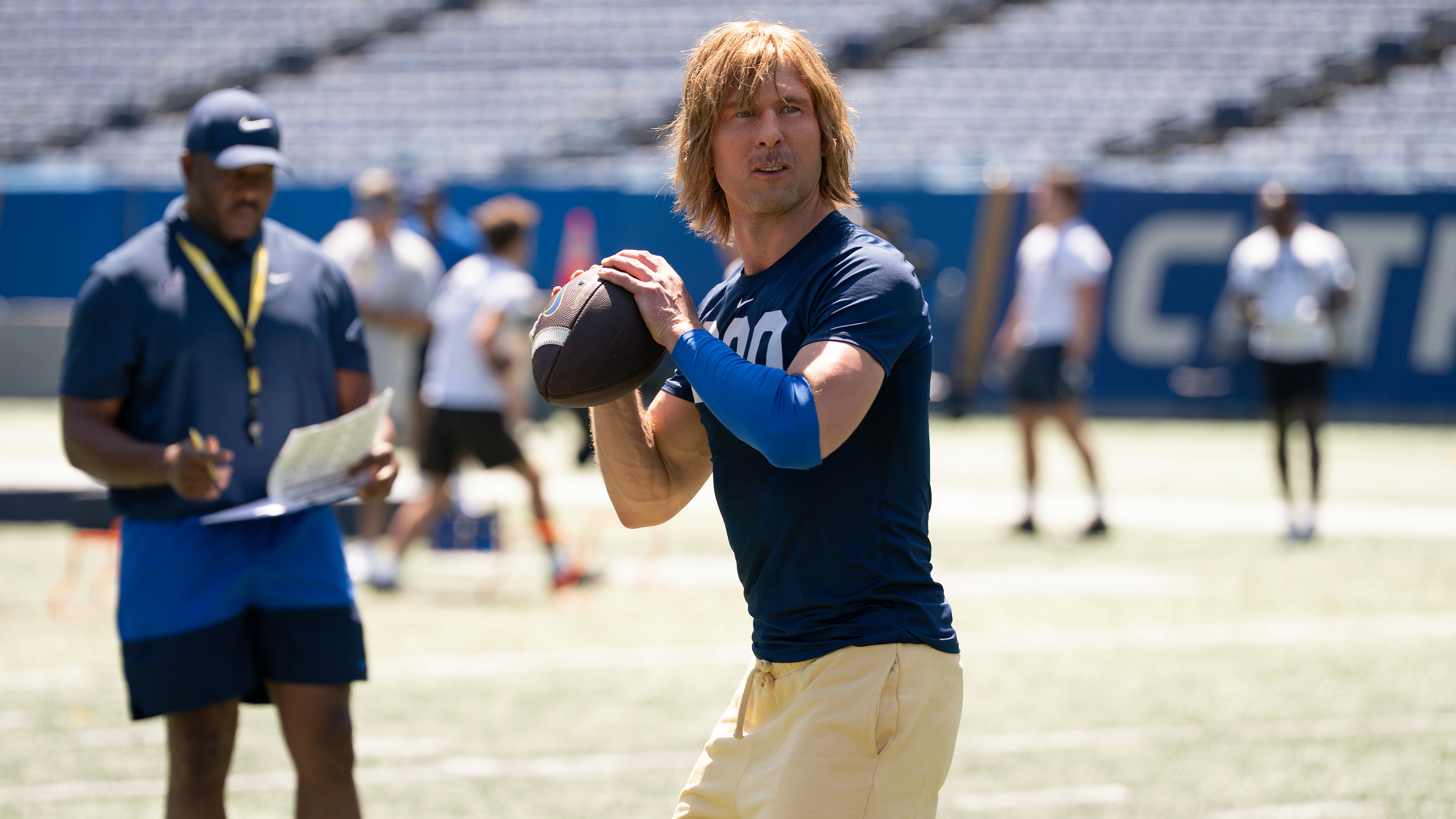 Chad Powers (Glen Powell) prepares to throw a football in a scene from Disney/Hulu&#039;s &amp;quot;Chad Powers&amp;quot;