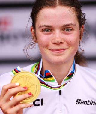 GLENTRESS FOREST - PEEBLES, SCOTLAND - AUGUST 10: Gold medalist Isabella Holmgren of Canada celebrates winning during the medal ceremony after the Women Junior Cross-country Olympic at the 96th UCI Cycling World Championships Glasgow 2023, Day 8 / #UCIWT / on August 10, 2023 in Glentress Forest - Peebles, Scotland. (Photo by Dean Mouhtaropoulos/Getty Images)