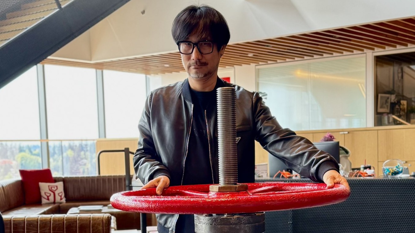 Hideo Kojima poses with various objects at Valve Software's offices.