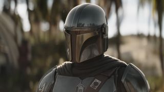 The Mandalorian standing at New Republic base in The Mandalorian and Grogu