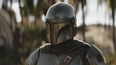 The Mandalorian standing at New Republic base in The Mandalorian and Grogu